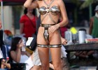 Hot blonde slut in steel swimming suit