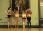 Watch this girls showing their perfect round butts in art galery