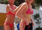Hot girl rubbing their bodies with sun lotion